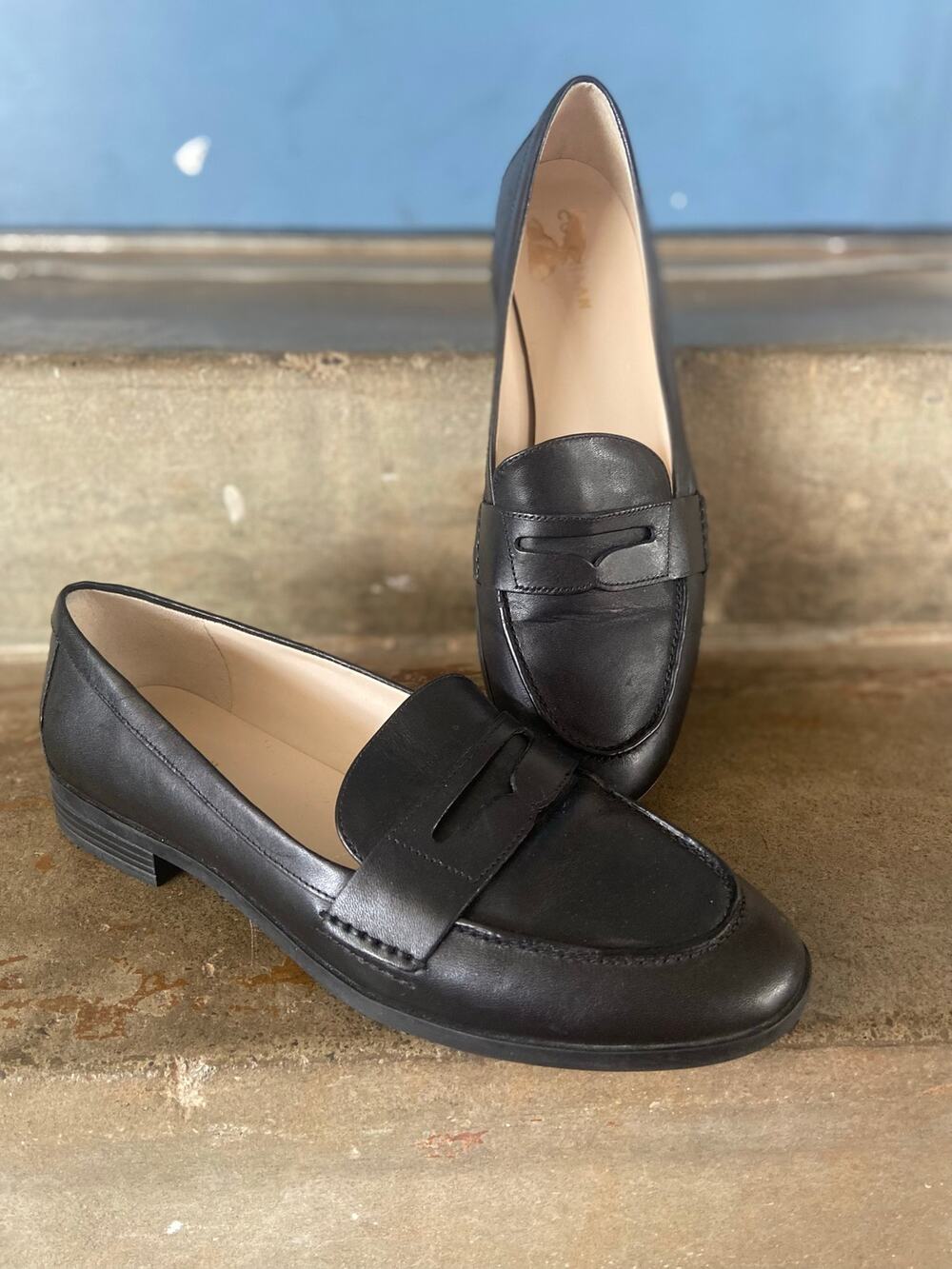 Cole Haan black leather penny loafers